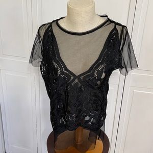 Black top sheer, with la e overlay